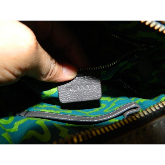 Oryany Kaye Round Whip Stitch Pebbled Leather Crossbody Bag Tassel & Adj Strap - Picture 15 of 16